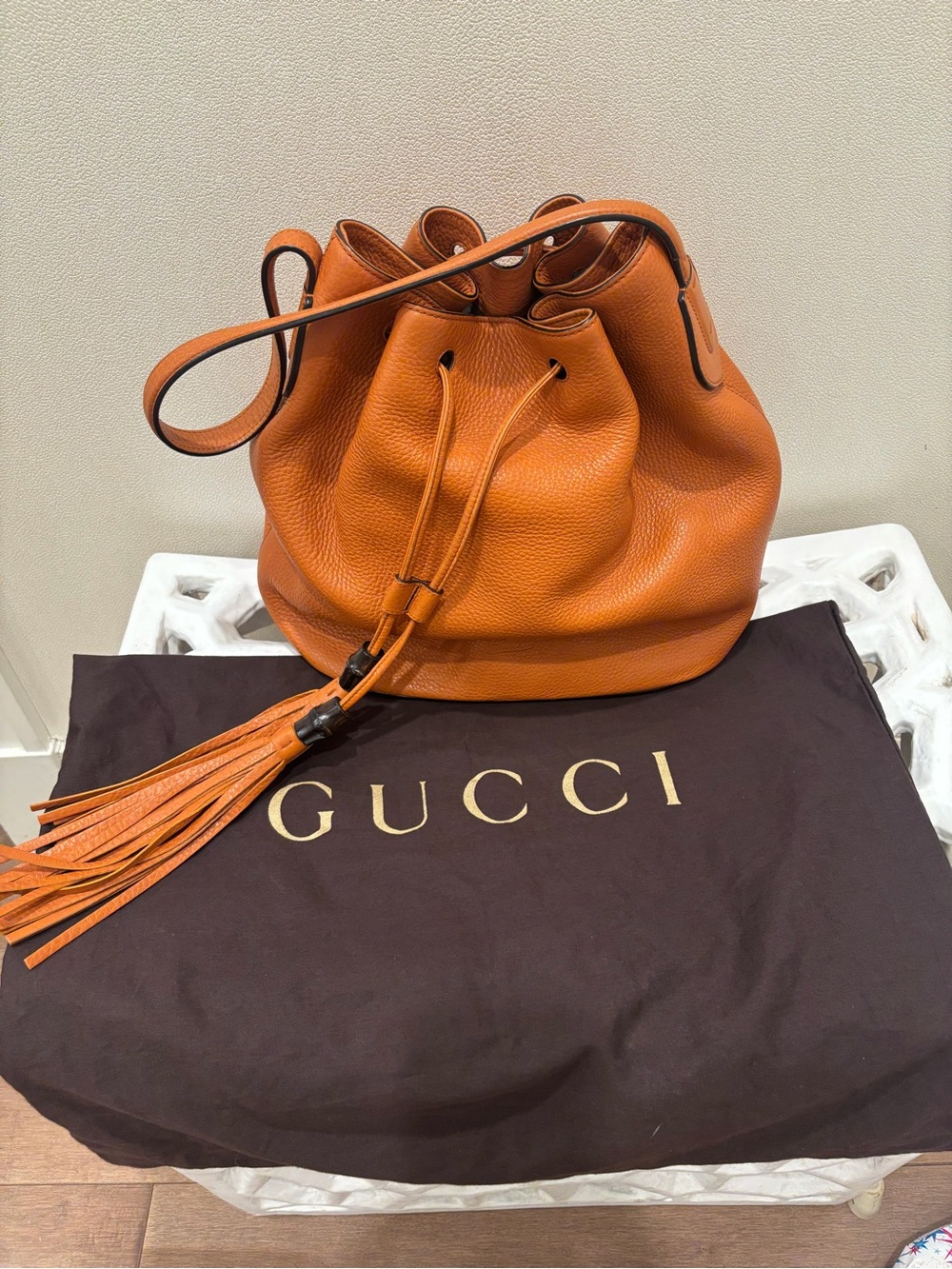 Gucci Orange Leather Drawstring Bucket Bag with Tassel